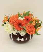 Football and flowers fresh arrangement