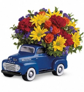 Teleflora’s Ford Pickup Truck Fresh Flower Arrangement in a keepsake container
