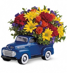 Teleflora’s 48 Ford Pickup Truck Fresh Flower Arrangement in a keepsake container