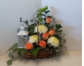 Forever in our hearts fresh floral arrangement with a battery lantern