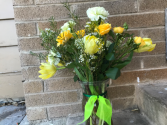 Four Seasons of Yellow Sympathy flowers
