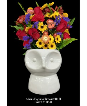 Foxy Blooms  Fresh cut flowers in a ceramic container