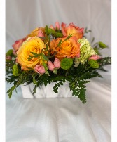 Free Spirit  Mixed blooms in a marble container