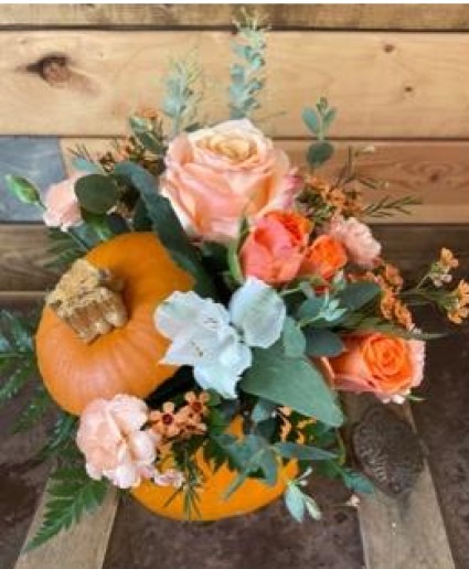 fresh orange pumpkin table arrangment 