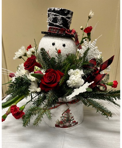 Frosty Fresh flowers with decorative container and snowman