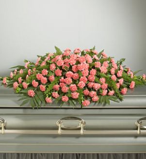 FULL COVER CARNATION CASKET SPRAY 200.Carnations avalilable red,white or yellow