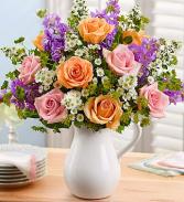 Full Of Colorful Roses Pitcher All Around Arrangement