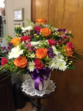 Funeral Arrangement Mache' filled with flowers of choice