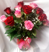 6 Red Roses and 6 Pink Roses arranged in a vase With filler!