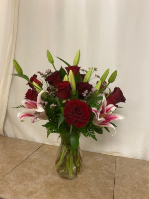 Gazers and Roses Vase of stargazers and red roses