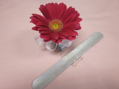 Single Gerbera Daisy Corsage, Snap Band or Wrist  $20.00, Comes in several colors