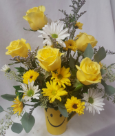MAKE SOMEONE HAPPY BOUQUET!! Yellow roses, white and yellow daisies with baby's breath arranged in a cute happy face mug!