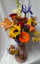 Beautiful Autumn ceramic Vase with dangling  Fall leaves and seasonal  flowers arranged with Birthday Pic and also comes with a small bag of miniature chocolates.