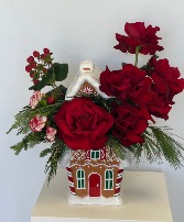 Gingerbread house in red roses  