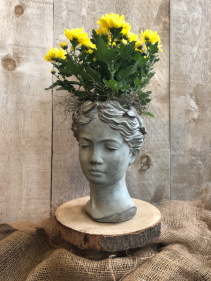 Goddess Head with yellow mums potted planter
