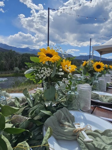 Golden Hour Gather Sun-kissed blooms and mountain views — the perfect rustic touch for your ‘I do’ in Canon City, CO | TOUCH OF LOVE FLORIST AND WEDDINGS