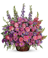 Gracious lavender Basket sympathy arrangement