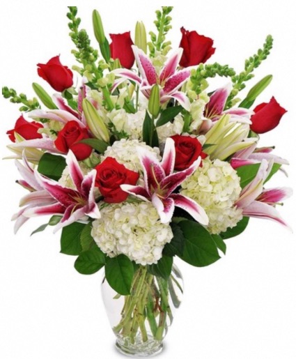 Grand rose, lily, hydrangea blooms  Vase luxury 