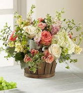 Green and Peach Basket Flower Basket Arrangement