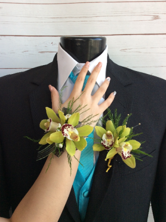 Green Orchid Corsage & Boutonniere Pair See our Corsage & Bout Pair Page