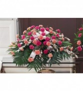 CELEBRATION OF LIFE Half Casket Spray of light pink and hot pink carnations and filler. ( Any color carnations can be used).