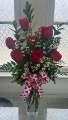 Half dozen of roses.   Vase 