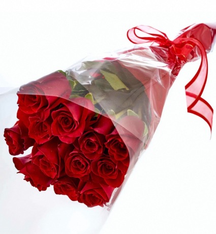 Hand tied  12 RED roses No Vase  Call the store if you would like greens & filler 