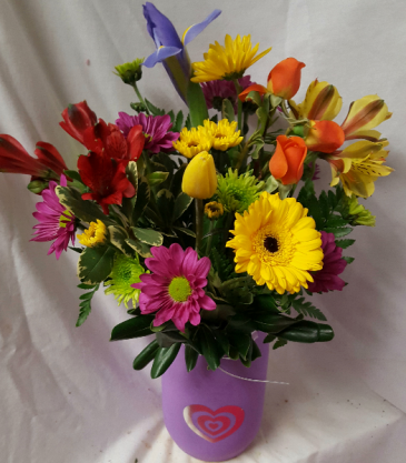 Mason Jar with Silver Heart Bouquet! Seasonal bright flowers arranged in a heart mason jar. (mason jar may vary in color...purple, teal or pink)