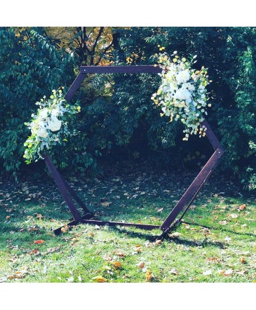 Hexagon Arch  This arch rents for $100.00 and floral add on can be $100-$300.  in Tiffin, OH | Rose Leaf Flowers