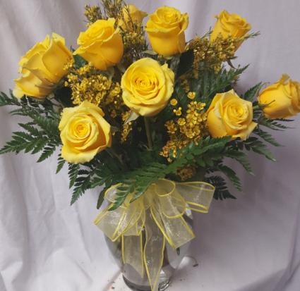 DOZEN Yellow Roses arranged with yellow wax flower As the filler...If wax flower  is out of season we will substitute with baby's breath