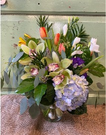 Hints of Spring  arrangement in a vase 