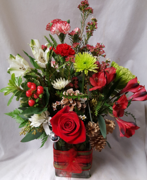 Green and red colors arranged in a cute  rectangular vase with ribbon detail!