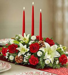 Holiday Flair Centerpiece in Winston Salem, NC | RAE'S NORTH POINT FLORIST INC. Holiday Flair Centerpiece in Winston Salem, NC | RAE'S NORTH POINT FLORIST INC.