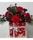 Holiday Hearth Surprise Christmas Floral Arrangement