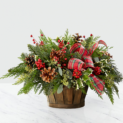 Holiday Homecomings Basket Winter arrangement