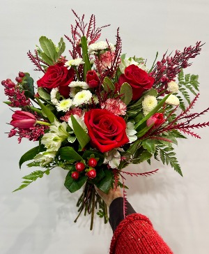 Holly Jolly Hostess Arrangement hand held