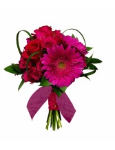 hot pink and red hand held bouquet 