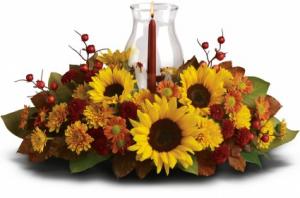 Hurricane and Sunflowers Centerpiece in Lebanon, NH | LEBANON GARDEN OF EDEN FLORAL SHOP Hurricane and Sunflowers Centerpiece in Lebanon, NH | LEBANON GARDEN OF EDEN FLORAL SHOP