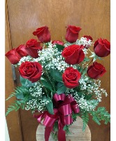  dozen red roses with babies breath in vase
