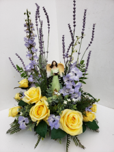 In Loving Memory Permanent arrangement with a keepsake angel