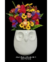 It's a Hoot  Fresh cut flowers in a ceramic container
