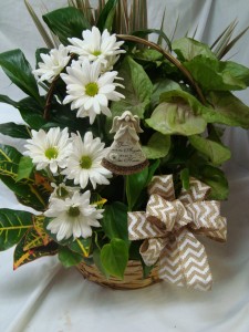 Planter with cut flowers or seasonal silk flowers