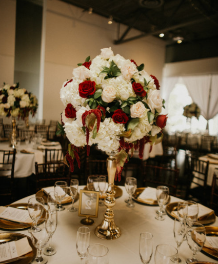 Ivory and red rose  Wedding reception flowers