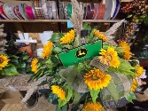 John Deere Silk Spray on brick with solar light  