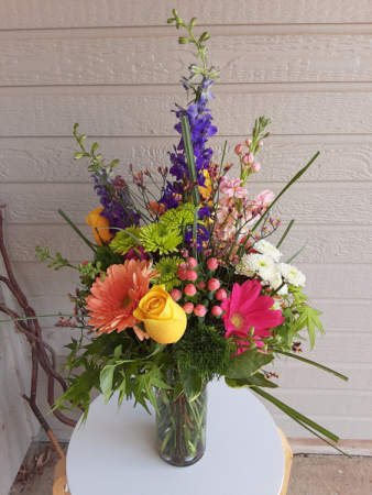 keep it in the wild flower side vase or in basket or ceramic