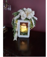 Lanterns Lanterns with greenery and ribbon