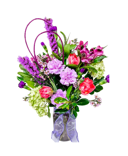 Lavender Love Whimsical vase bouquet of a lovely assortment of purple and lavender blooms.