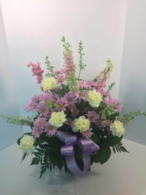 lavender ,pink,and yellow funeral arrangement in Lebanon, NH | LEBANON GARDEN OF EDEN FLORAL SHOP lavender ,pink,and yellow funeral arrangement in Lebanon, NH | LEBANON GARDEN OF EDEN FLORAL SHOP