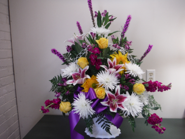 Lily Bright Funeral Basket Sympathy arrangements