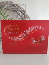 LINDOR MILK CHOCOLATE TRUFFLES Indiviually wrapped and melt in your mouth chocolate bites.